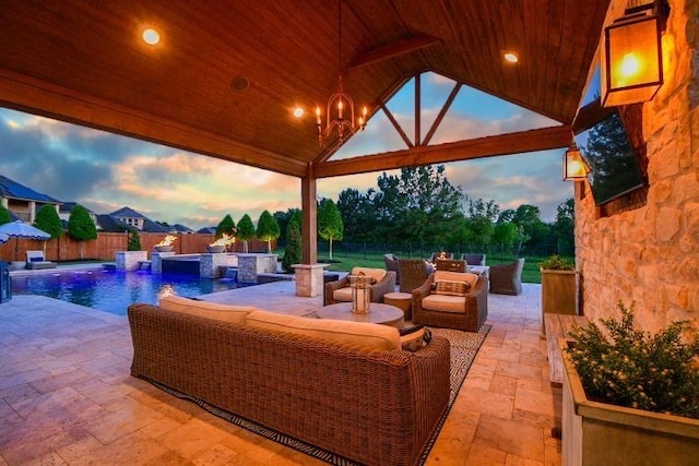 28011 Burnett Hills Ln, Fulshear, TX 77441 - fenced backyard with an outdoor hangout area and a patio