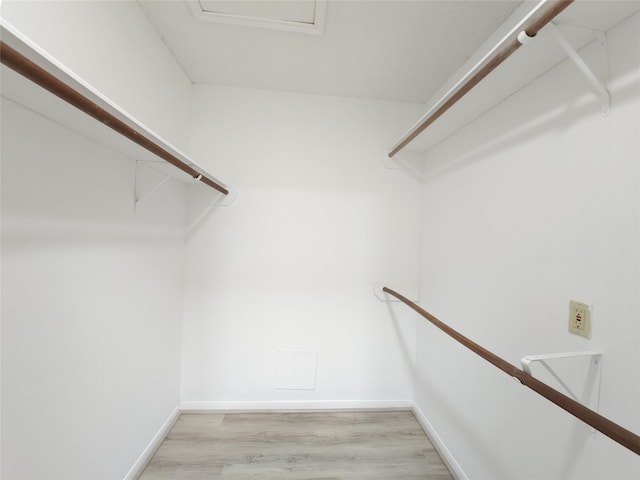 3226 Country Club Blvd, Stafford, TX 77477 - walk in closet featuring light wood finished floors