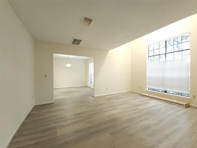 3226 Country Club Blvd, Stafford, TX 77477 - unfurnished room featuring light wood-style flooring and baseboards