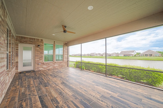 430 Seaside Sparrow Way, Richmond, TX 77469 - unfurnished sunroom with a water view and a residential view