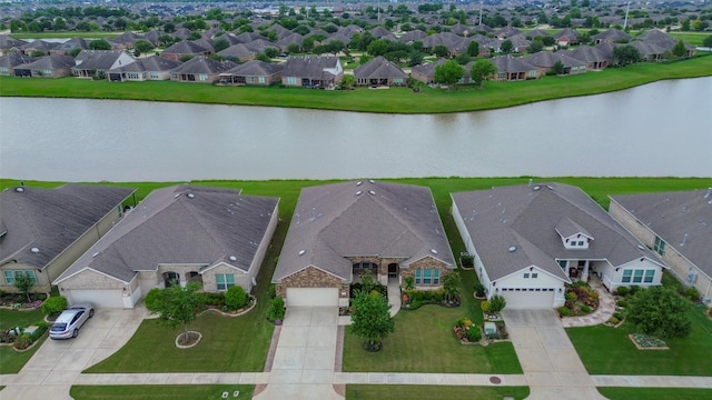 430 Seaside Sparrow Way, Richmond, TX 77469 - aerial view of residential area with a large body of water