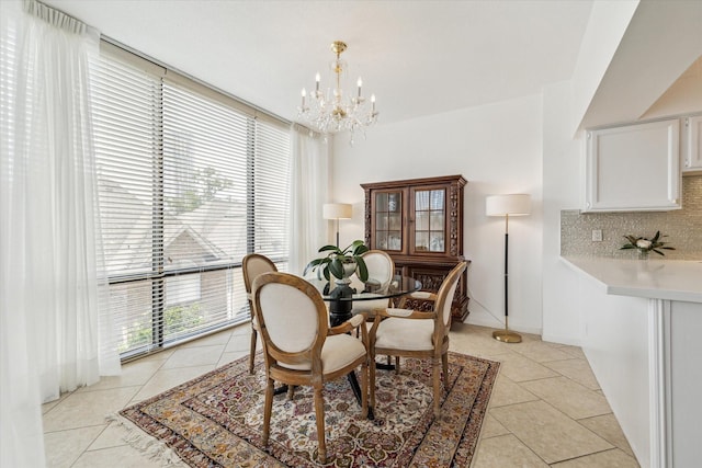 1111 Bering Dr Unit 301, Houston, TX 77057 - dining space with light tile patterned floors and a chandelier