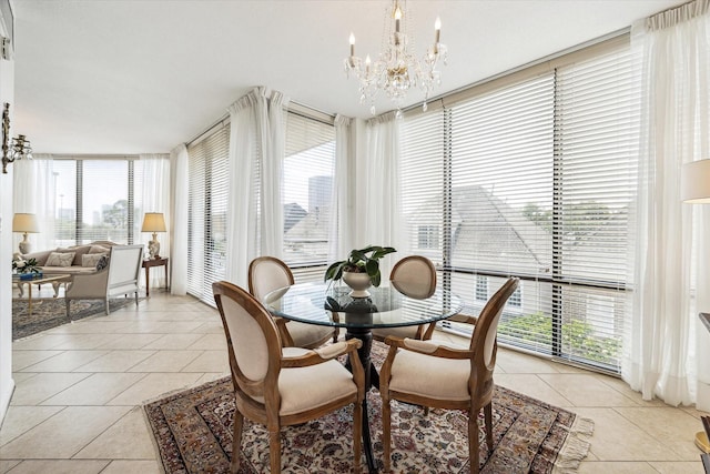 1111 Bering Dr Unit 301, Houston, TX 77057 - dining space featuring a chandelier, light tile patterned floors, and healthy amount of natural light