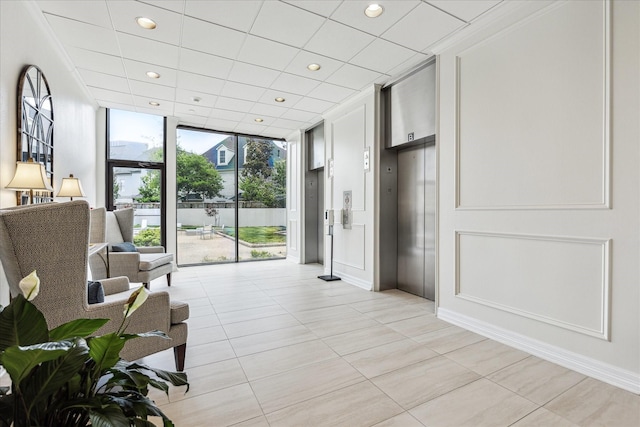 1111 Bering Dr Unit 301, Houston, TX 77057 - building lobby with expansive windows and recessed lighting