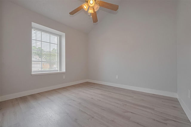 22010 Rivermead Dr, Katy, TX 77449 - unfurnished room with wood finished floors, lofted ceiling, baseboards, and ceiling fan