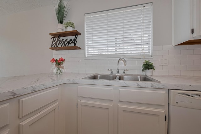 22010 Rivermead Dr, Katy, TX 77449 - kitchen featuring white dishwasher, open shelves, a sink, white cabinetry, and tasteful backsplash
