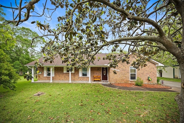 11855 23rd St, Santa Fe, TX 77510 - ranch-style house with brick siding and a front lawn