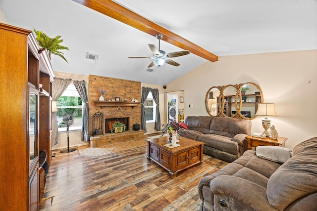 11855 23rd St, Santa Fe, TX 77510 - living room featuring hardwood / wood-style floors, a ceiling fan, and a brick fireplace