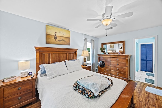 11855 23rd St, Santa Fe, TX 77510 - bedroom featuring wood finished floors and ceiling fan