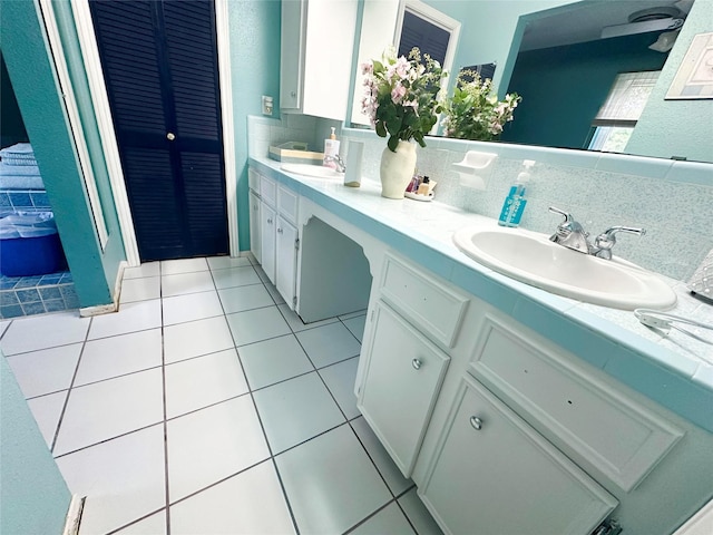 11855 23rd St, Santa Fe, TX 77510 - full bathroom with double vanity and tile patterned flooring
