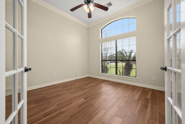 226 Beasley Reef Dr, Beach City, TX 77523 - empty room featuring french doors, crown molding, a ceiling fan, and wood finished floors