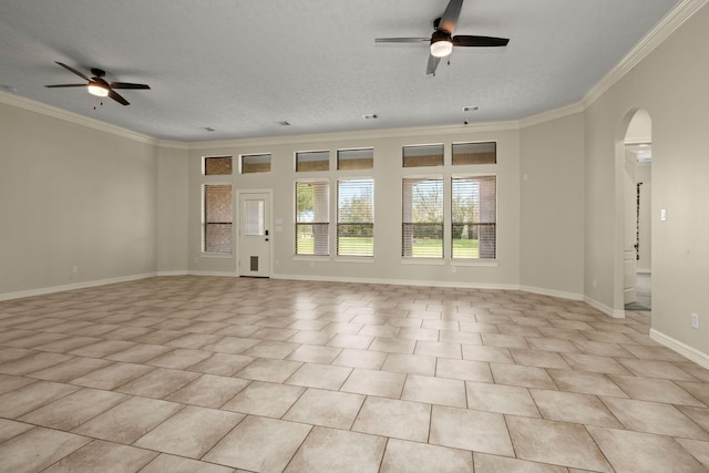 226 Beasley Reef Dr, Beach City, TX 77523 - empty room featuring a ceiling fan, ornamental molding, arched walkways, and baseboards