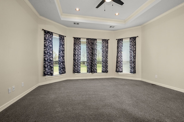 226 Beasley Reef Dr, Beach City, TX 77523 - carpeted empty room featuring a tray ceiling, a ceiling fan, healthy amount of natural light, ornamental molding, and recessed lighting