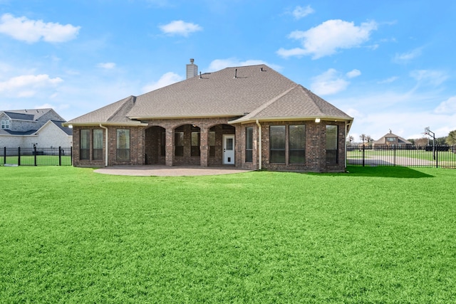 226 Beasley Reef Dr, Beach City, TX 77523 - back of property featuring brick siding, a patio area, a chimney, and a shingled roof