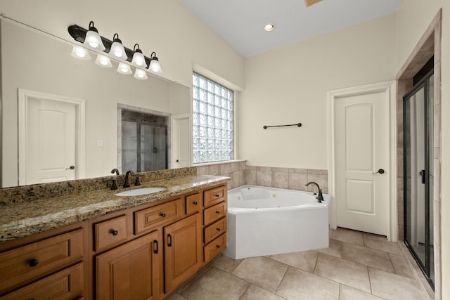 226 Beasley Reef Dr, Beach City, TX 77523 - full bathroom featuring a stall shower, vanity, a bath, and tile patterned floors