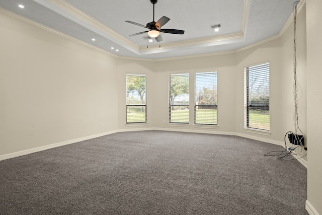 226 Beasley Reef Dr, Beach City, TX 77523 - spare room featuring crown molding, a raised ceiling, carpet flooring, ceiling fan, and baseboards