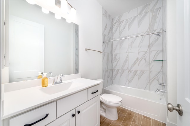 4603 Vaughan Way, Iowa Colony, TX 77583 - full bath featuring toilet, wood tiled floors, vanity, and  shower combination
