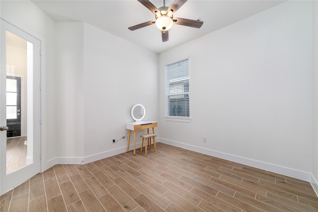 4603 Vaughan Way, Iowa Colony, TX 77583 - unfurnished room with baseboards, wood finished floors, and ceiling fan