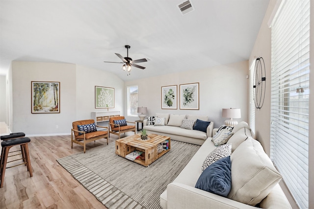 20511 Kendall Cliff Ct, Katy, TX 77449 - living area featuring light wood finished floors, a ceiling fan, and baseboards