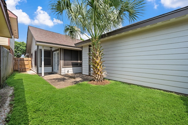 8621 Beechcrest St, Houston, TX 77083 - rear view of house featuring a patio and a sunroom