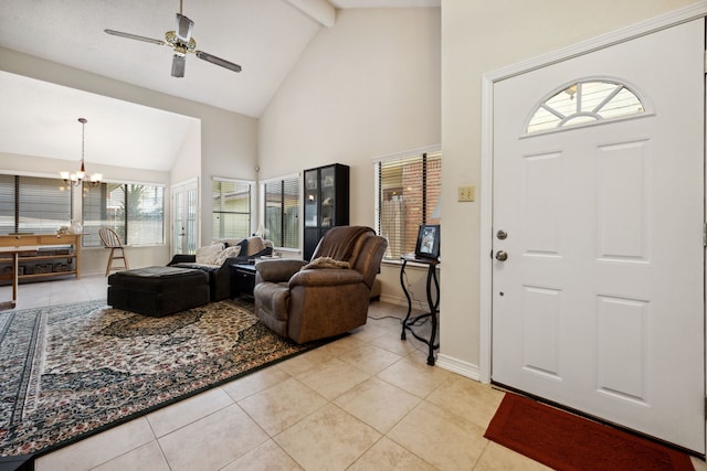 8621 Beechcrest St, Houston, TX 77083 - living area featuring light tile patterned flooring, a ceiling fan, high vaulted ceiling, a chandelier, and beam ceiling