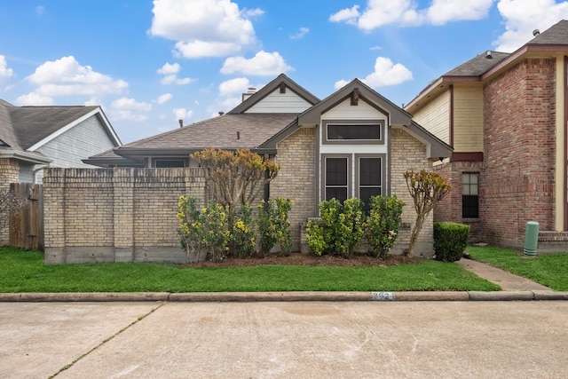 8621 Beechcrest St, Houston, TX 77083 - view of side of property with fence and brick siding