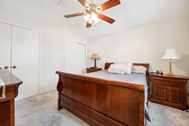 8621 Beechcrest St, Houston, TX 77083 - bedroom with light carpet, multiple closets, vaulted ceiling, and ceiling fan