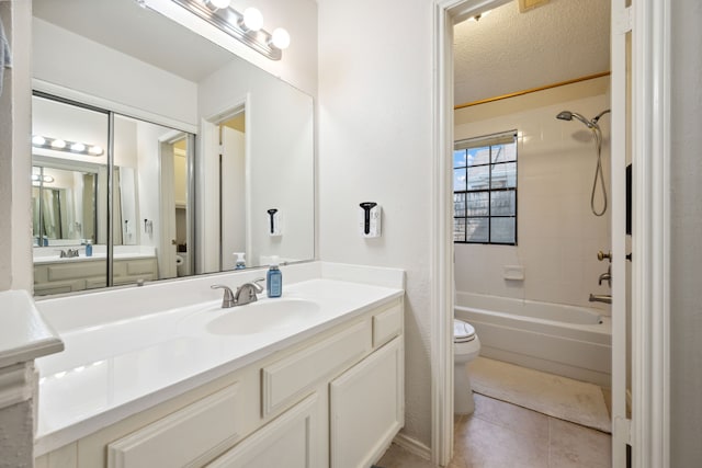 8621 Beechcrest St, Houston, TX 77083 - bathroom with toilet, shower / bathtub combination, tile patterned flooring, vanity, and a textured ceiling