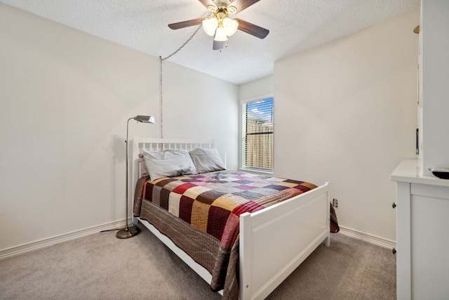 8621 Beechcrest St, Houston, TX 77083 - bedroom featuring carpet flooring, a textured ceiling, baseboards, and a ceiling fan