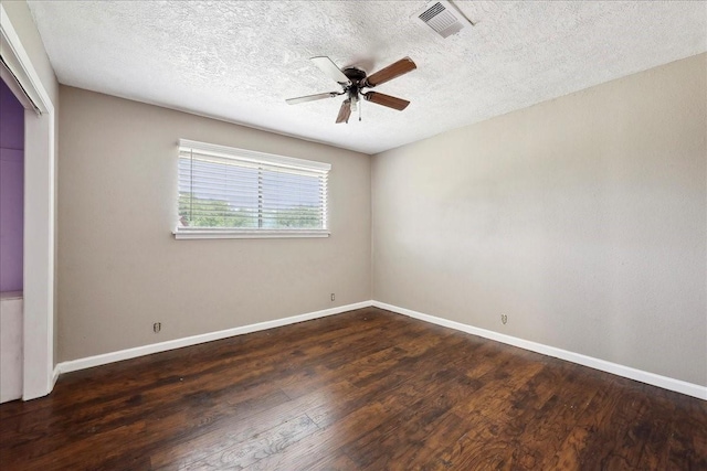 240 Berwick Dr, Bridge City, TX 77611 - unfurnished bedroom featuring dark wood-type flooring, baseboards, a closet, a textured ceiling, and ceiling fan