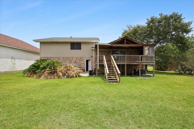 240 Berwick Dr, Bridge City, TX 77611 - rear view of house featuring stairway, a lawn, a wooden deck, and brick siding