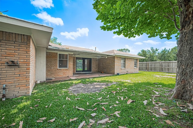 5243 Stillbrooke Dr, Houston, TX 77096 - view of yard featuring a patio