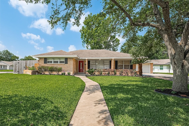 5243 Stillbrooke Dr, Houston, TX 77096 - single story home with brick siding, a garage, a porch, and driveway