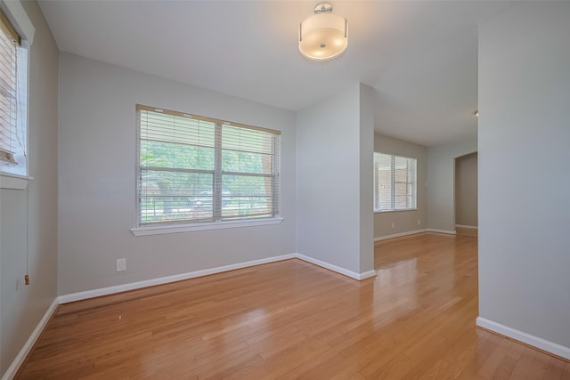5243 Stillbrooke Dr, Houston, TX 77096 - empty room with light wood finished floors and baseboards