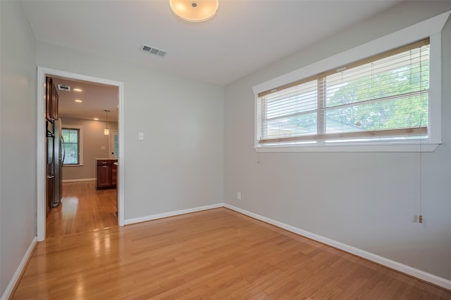 5243 Stillbrooke Dr, Houston, TX 77096 - unfurnished room featuring light wood-style floors and baseboards