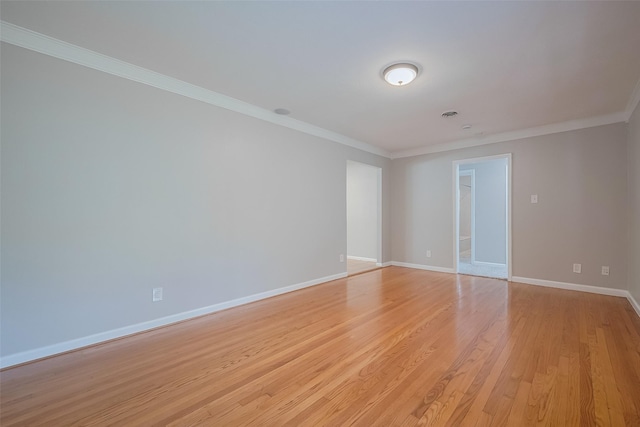 5243 Stillbrooke Dr, Houston, TX 77096 - spare room featuring ornamental molding, light wood finished floors, and baseboards