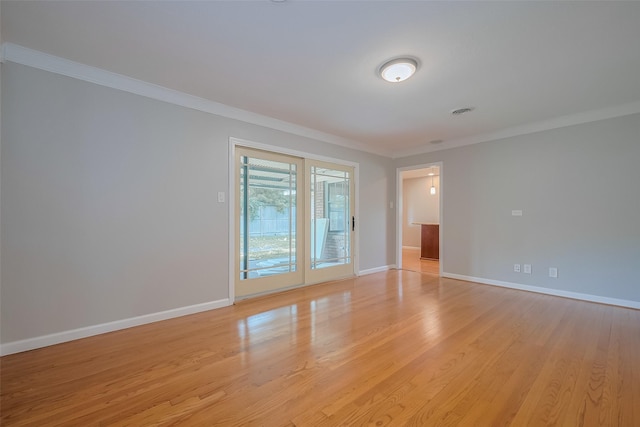 5243 Stillbrooke Dr, Houston, TX 77096 - unfurnished room with ornamental molding, baseboards, and light wood finished floors