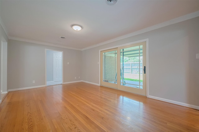 5243 Stillbrooke Dr, Houston, TX 77096 - empty room with ornamental molding, light wood-style flooring, and baseboards