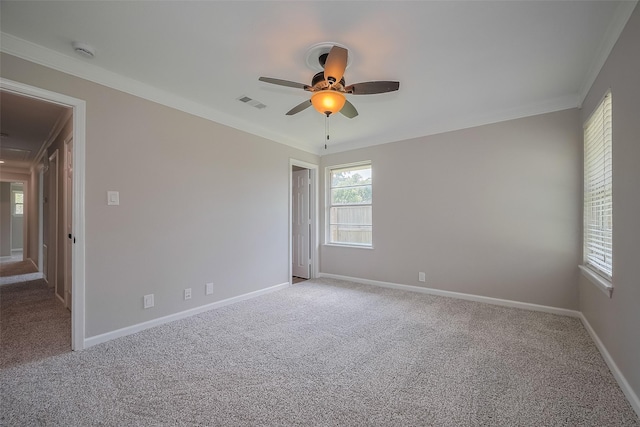 5243 Stillbrooke Dr, Houston, TX 77096 - spare room featuring carpet flooring, a ceiling fan, crown molding, baseboards, and a smoke detector