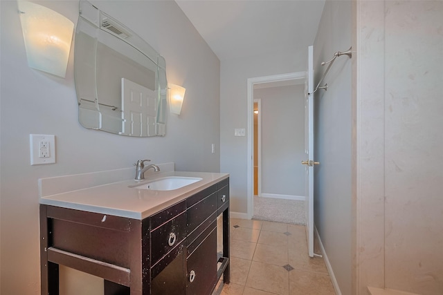 5243 Stillbrooke Dr, Houston, TX 77096 - bathroom featuring vanity, tile patterned flooring, and baseboards