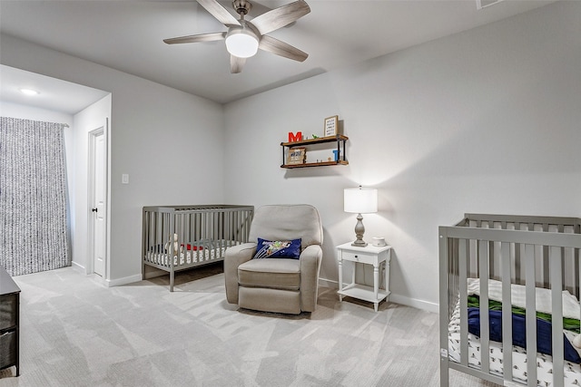 24910 Hibiscus Garden Way, Katy, TX 77493 - bedroom with carpet, baseboards, and ceiling fan