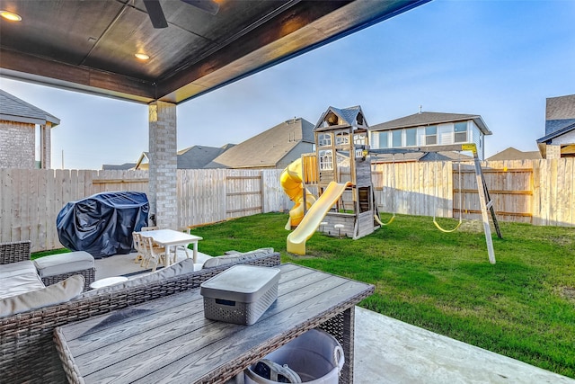 24910 Hibiscus Garden Way, Katy, TX 77493 - view of patio featuring a playground, ceiling fan, and a grill