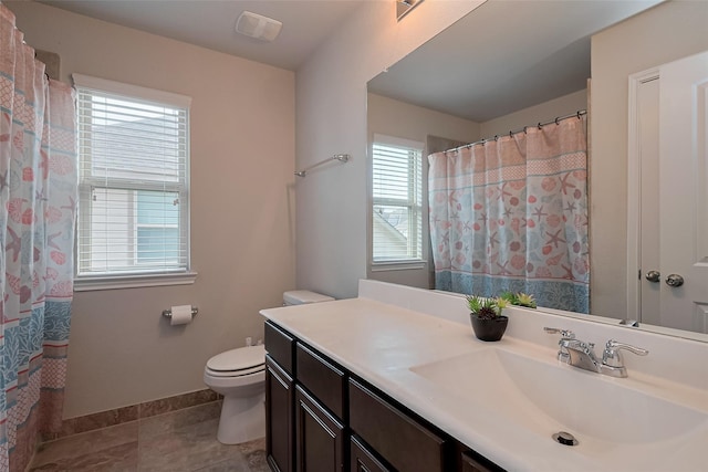 9823 Corben Creek Ln, Richmond, TX 77407 - full bath featuring toilet, baseboards, vanity, and tile patterned flooring