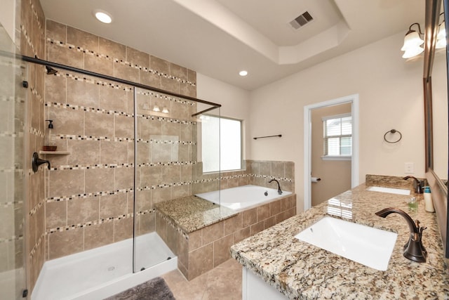 10805 N Kyler Oaks Pl, Houston, TX 77043 - full bath featuring double vanity, a garden tub, a shower stall, recessed lighting, and tile patterned floors