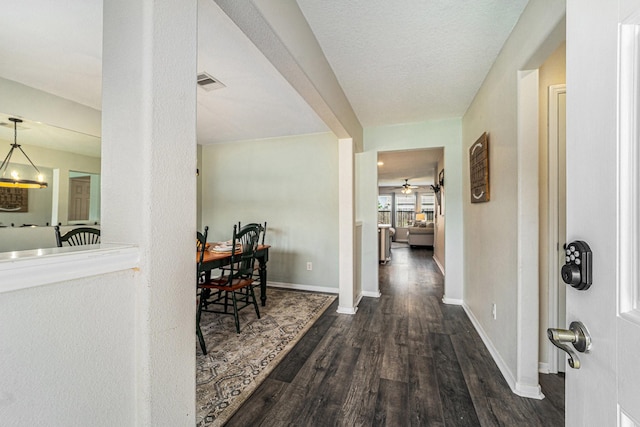 16731 Foursquare Dr, Conroe, TX 77385 - hallway featuring wood finished floors and baseboards