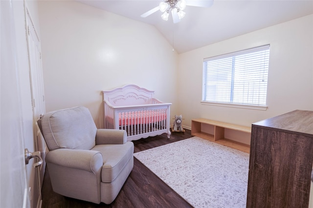 5910 Hatfield Glen Dr, Katy, TX 77449 - bedroom with dark wood finished floors, vaulted ceiling, a ceiling fan, and a nursery area