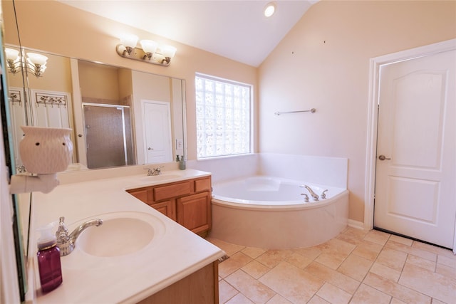 5910 Hatfield Glen Dr, Katy, TX 77449 - bathroom featuring a shower stall, vanity, vaulted ceiling, and a garden tub
