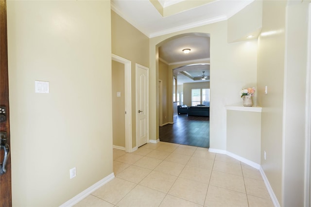 5910 Hatfield Glen Dr, Katy, TX 77449 - corridor featuring crown molding, arched walkways, and light tile patterned floors