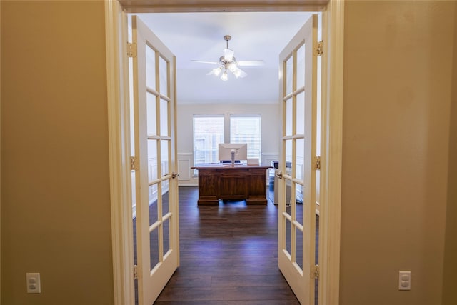 5910 Hatfield Glen Dr, Katy, TX 77449 - hallway featuring french doors, dark wood finished floors, a desk, ornamental molding, and wainscoting