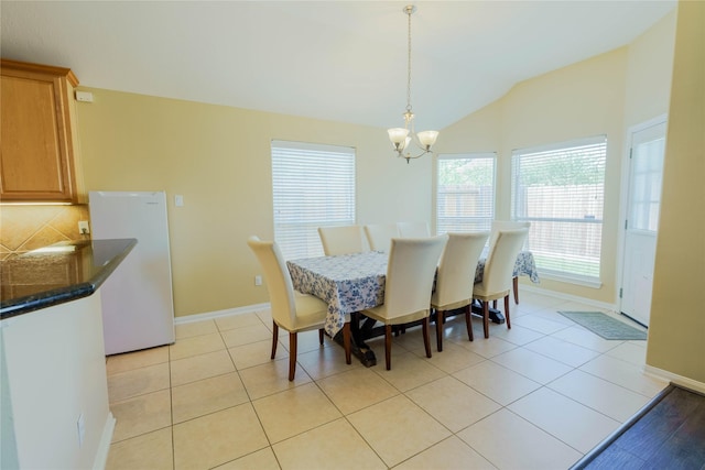 5910 Hatfield Glen Dr, Katy, TX 77449 - dining space with a chandelier, lofted ceiling, and light tile patterned flooring